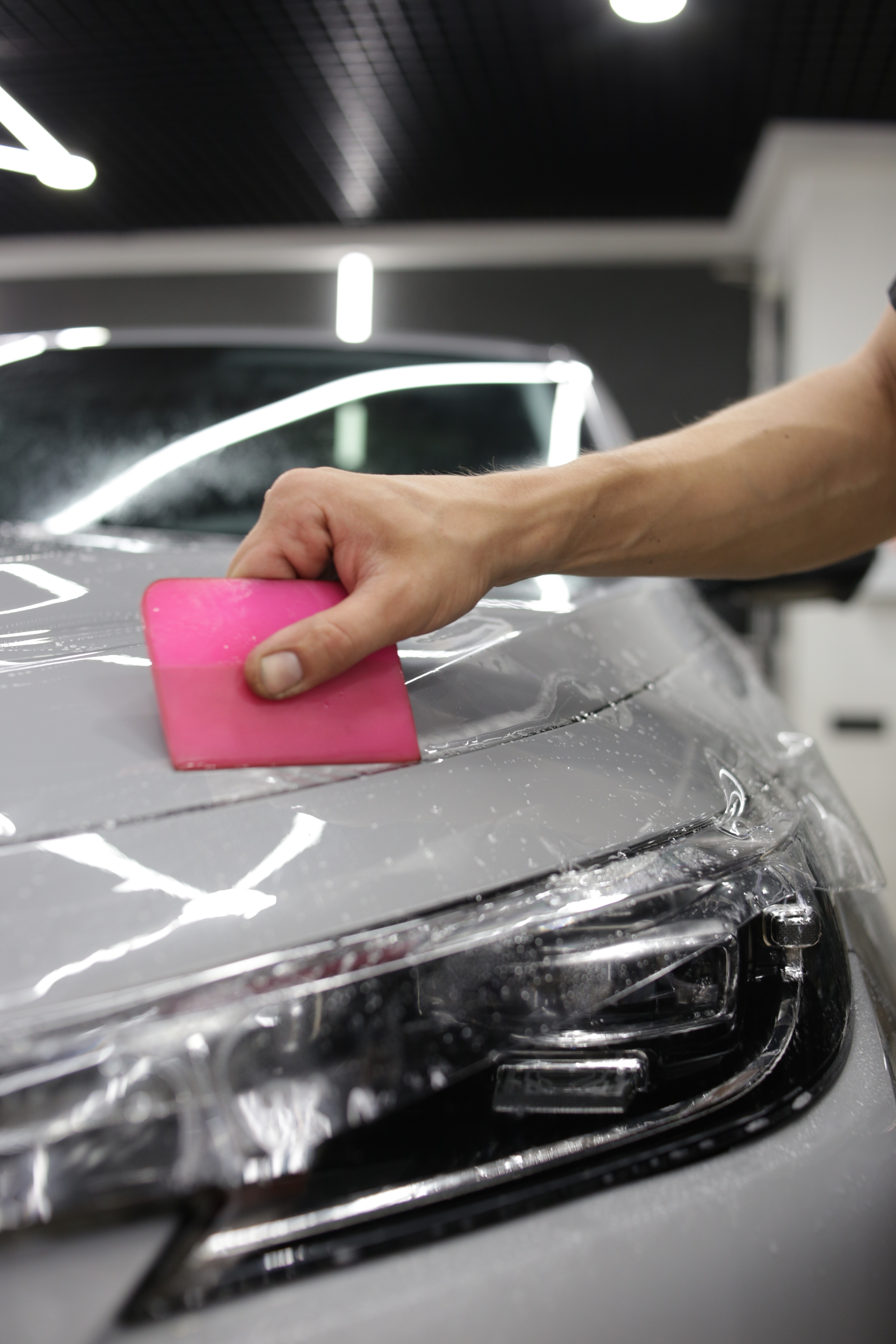 A paint protection film service applied by a Dapper Pros professional.