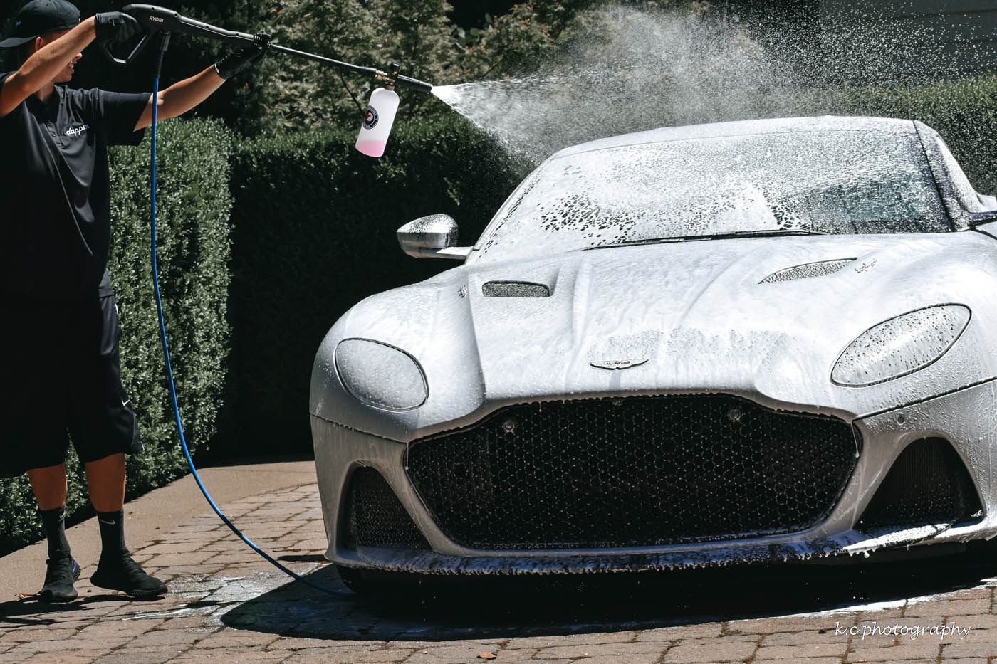 Dapper Pros washing a silver corvett, book your exterior car detailing. 