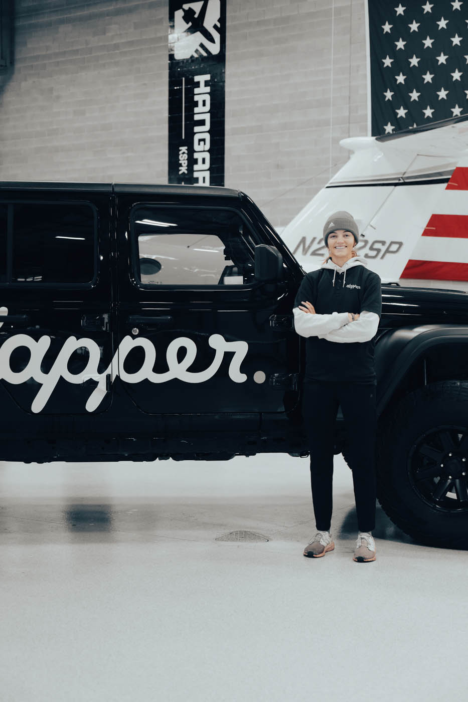 Dapper Pros owner standing beside the Dapper Pros jeep truck, book our car detailing for businesses today.