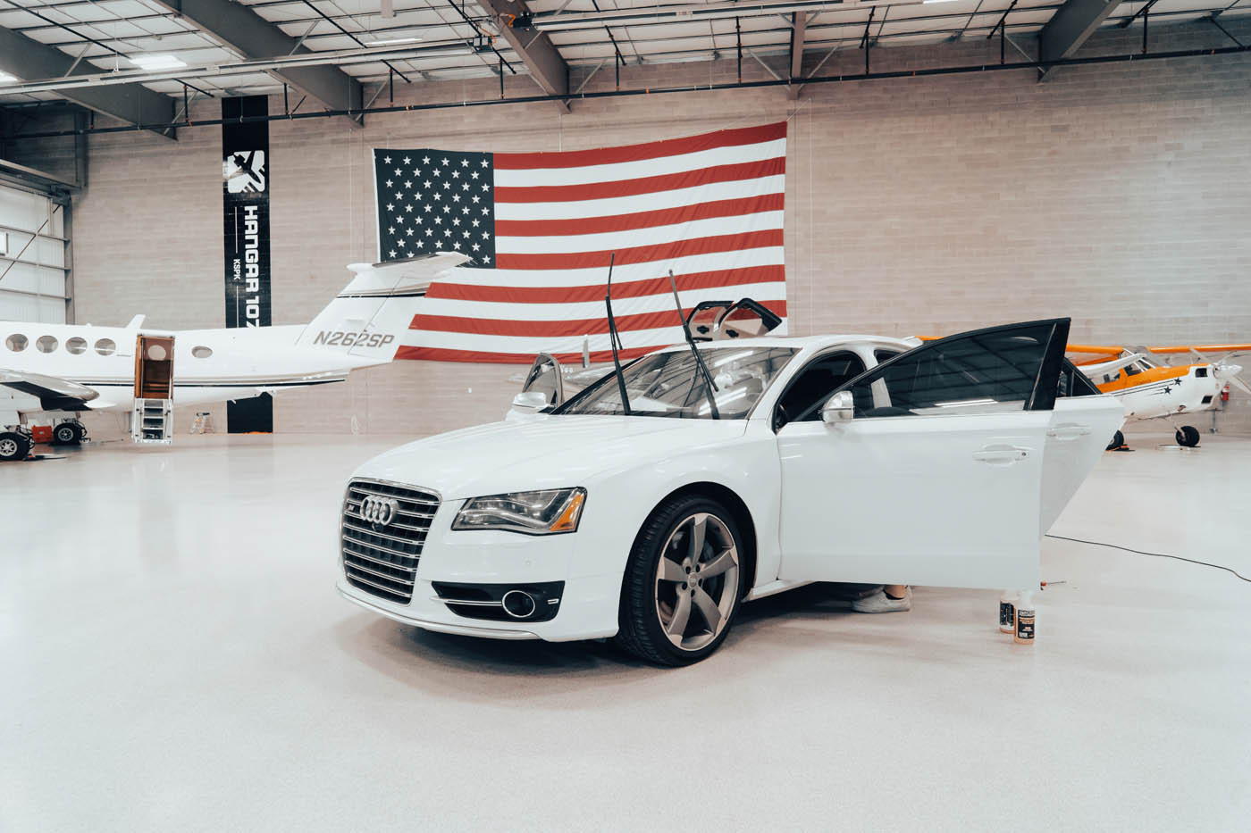 A white audi after recieving a car detailing service in Phoenix.