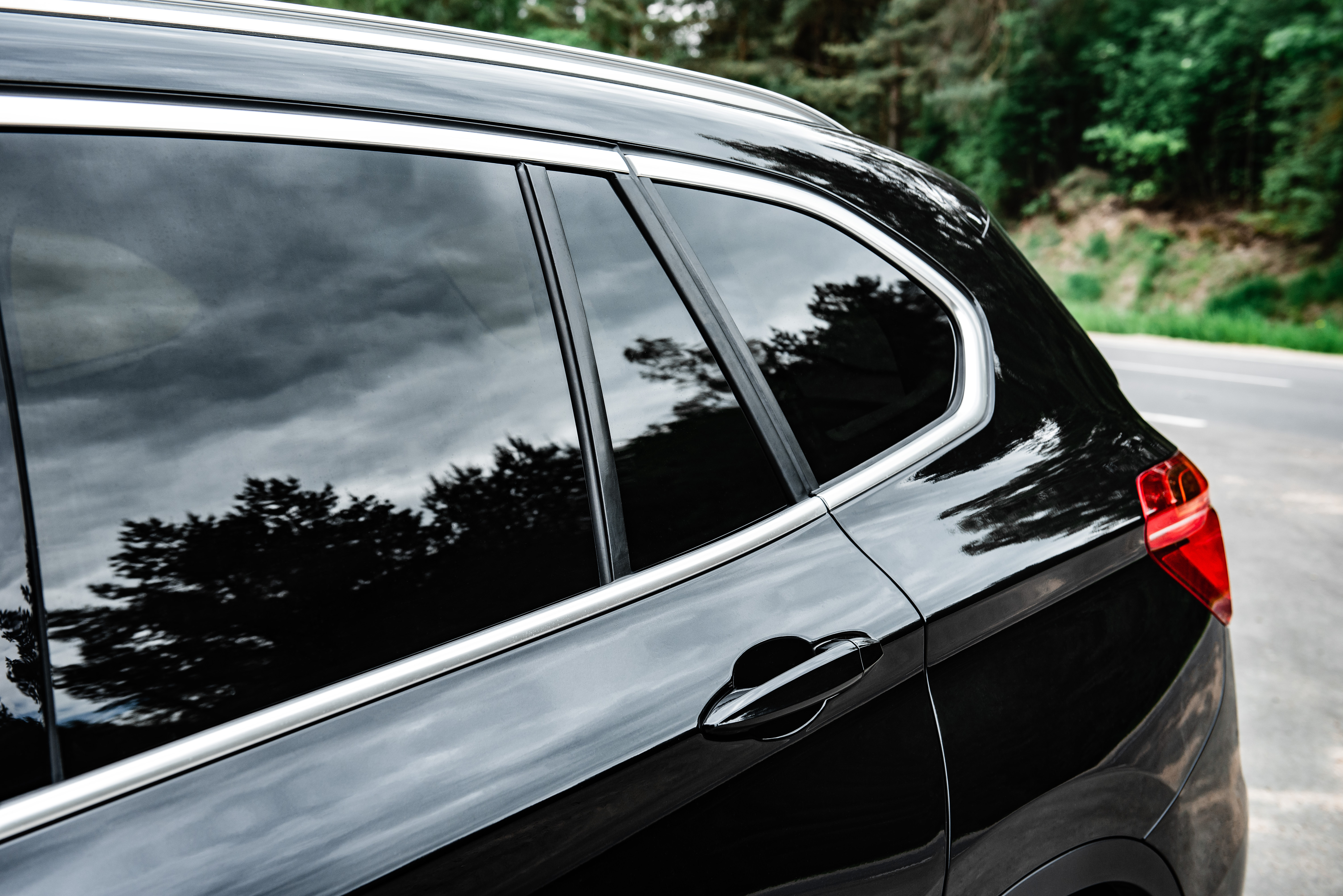 The back of a car with window tinting - experience unmatched service and quality when you choose Dapper Pros for car window tinting in Salt Lake City, UT.